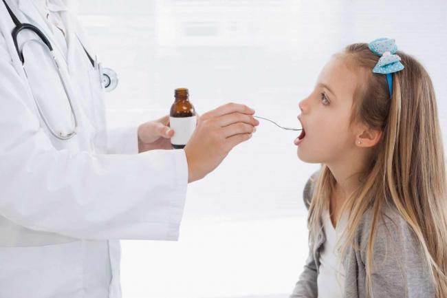 dr_girl_takingmed.jpg